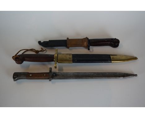 United States of America Ames knife, with 29½cm single edged blade, stamped USWD, with brass cross guard and wooden grips, co