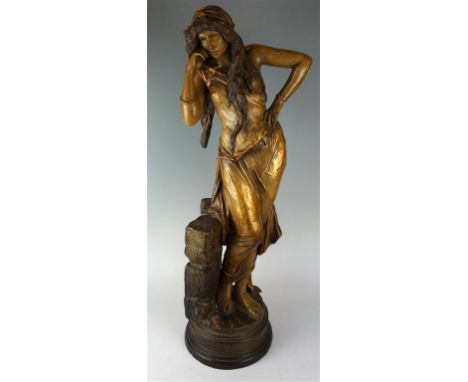 An Art Nouveau Goldscheider figure of 'Rebecca' modelled as a girl leaning, raised on naturalistic plinth base, impressed fac