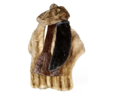 A circa 1960's light brown mink fur stole, fully lined with embroidered initials and floral motif, together with two further 