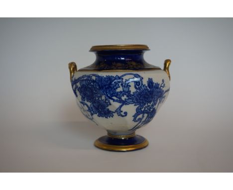 A James MacIntyre & Co twin handled vase of octagonal form decorated in Aurelian ware pattern, height 18cm CONDITION REPORT: 