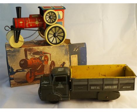 Two tinplate items comprising a boxed Technofix 261 road roller with red and blue cab, black chimney and fittings and cream w