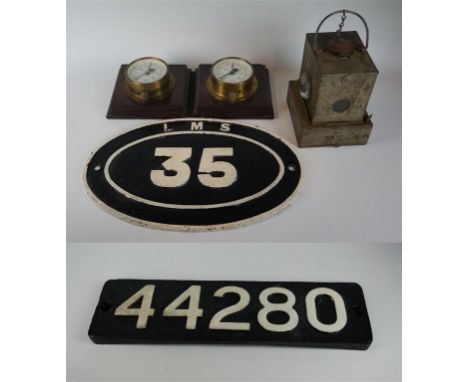 Railway interest: A collection of early to mid 20th Century railwayana, to include a cast metal square section oil lamp with 