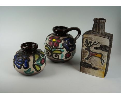 Three pieces of Scheurich West German Fat Lava ceramic to include a Montignac pattern shoulder bottle vase also two bulbous f