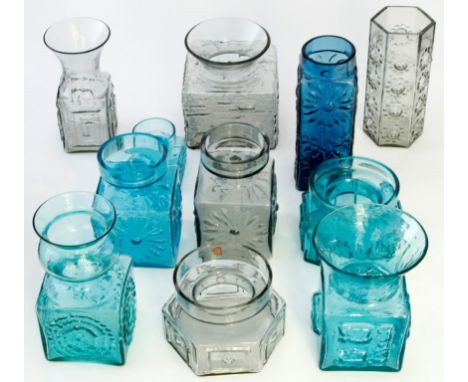 Eleven Dartington glass vases, to include kingfisher blue stylized flower, greek key, certificate X, Marguerite, powell and s