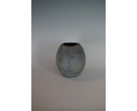 Chris Carter (b. 1945) A stoneware ovoid vase with pitted blue and purple glaze, height 21cm (illustrated) CONDITION REPORT: 