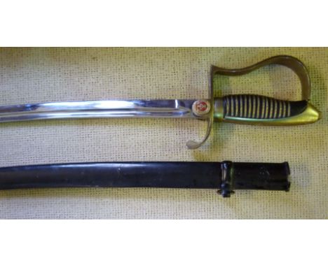 A soviet Russian sabre, with curved single edged single fullered blade, length of blade 84cm, with metal guard, guard with en