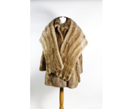 A circa 1970s pale brown mink fur jacket, hip length, with self-lined collar, slip pockets, triple hook fastening to front, f