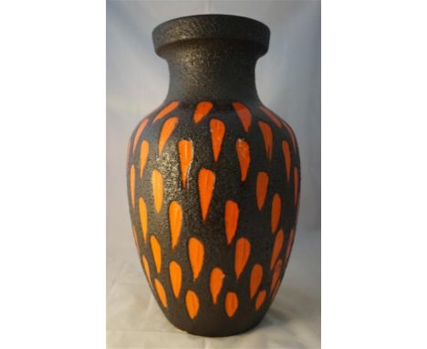 An impressive Scheurich West German ceramic Fat Lava floor vase of bulbous form with inverted neck, having orange glazed pane