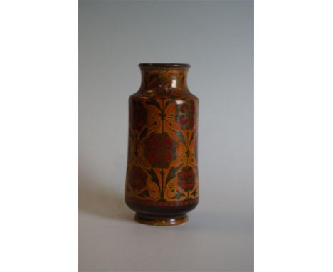 A Pilkington's Royal Lancastrian cylindrical vase with inverted neck, decorated with stylised motifs and tangerine ground imp