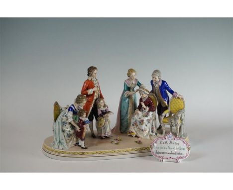 A Schwarza Saalbahn E.& A. Müller porcelain figure group, Circa 1895-1910, well modelled depicting a family interior scene, t