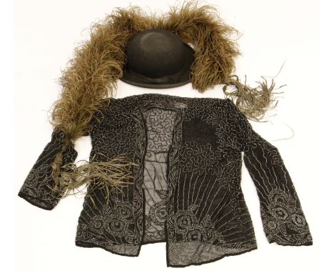 A circa 1930s opera jacket, of black chiffon, abundantly decorated with hand sewn beads in a meandering pattern with radiatin