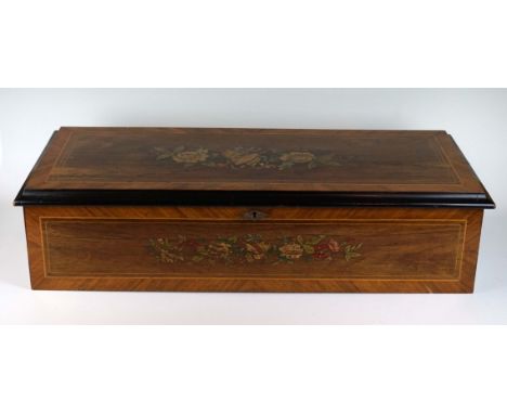 An Austrian or Swiss 19th Century Cylindrical music box, Circa 1860, the rosewood and Kingwood box with inlaid floral and mus