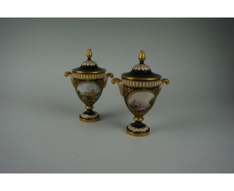A pair of Royal Worcester vases and covers, painted by Harry Davis, and dated 1910 and 1916, each with central vignette paint