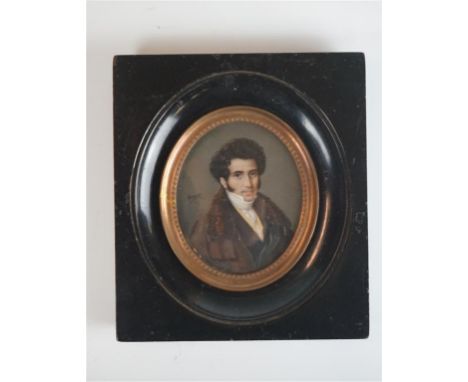 Attributed to Claude Charles Gerard, (French 1757-1826), an 18th/19th Century ivory portrait miniature of a nobleman, the han