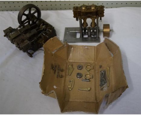 A Stuart Turner Score horizontal engine, with lubricator, length 15cm, a part built two cylinder engine, height 12cm and a St