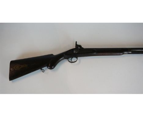 A mid 19th century percussion cap musket, 65cm octagonal barrel, the lock with traces of a crown, three quarter stocked with 