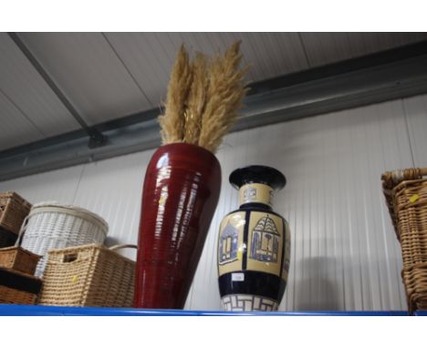 A red painted bamboo vase; together with china stick stand