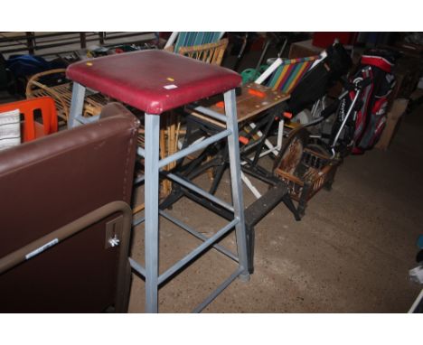 A large metal framed stool 