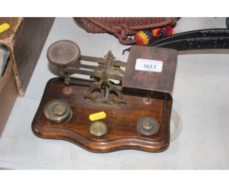 A set of postage scales and weights 