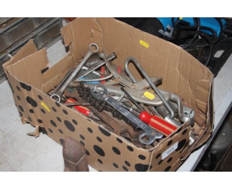 A box of various hand tools