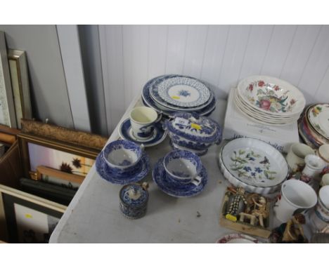 A quantity of mostly blue and white "Willow" patterned tea and dinnerware to include Spode etc