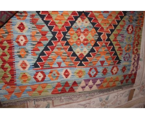 An approximate 4'9" x 3'5" vegetable die chobi kelim runner 
