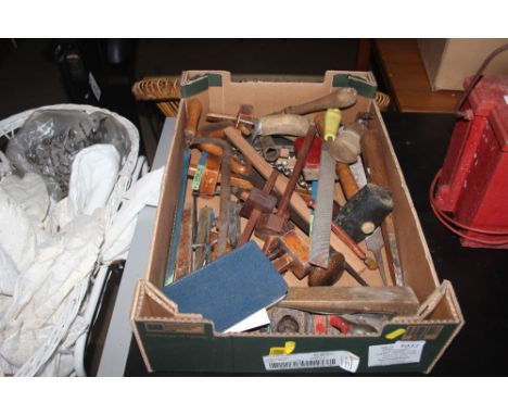 A box of various hand tools