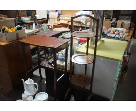 A mahogany three tier cake stand; together with a side table