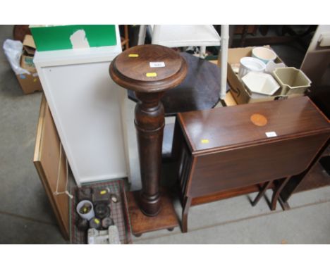 A wooden plant stand