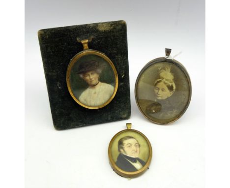 Miniature oval head and shoulders portrait of a lady on ivory, H6cm, another of a Gentleman and portrait photograph (3) Condi