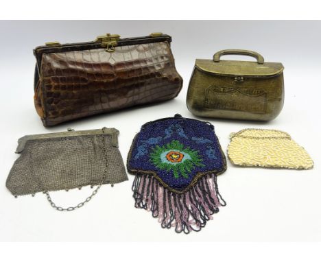 Early 20th century Huntley & Palmers tin plate biscuit tin in the form of a snakes skin handbag, 1940's beadwork purse, anoth