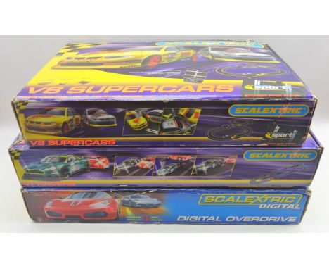 Three boxed sets of Scalextric; Scalextric Digital Overdrive with Ferrari 430, Scalextric GT Racers and Scalextric V8 Superca