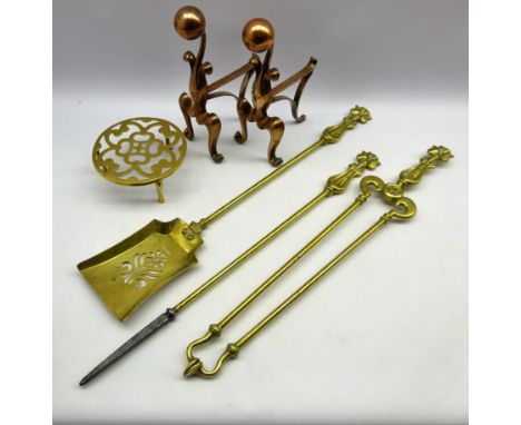 Pair Arts and Crafts copper fire dogs of scroll form with globular finial, 19th century three piece brass companion set with 