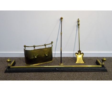 Cast iron and brass fire fender with ball and claw finials, L138cm, brass Tidy Betty and two brass fire tools (5) Condition R
