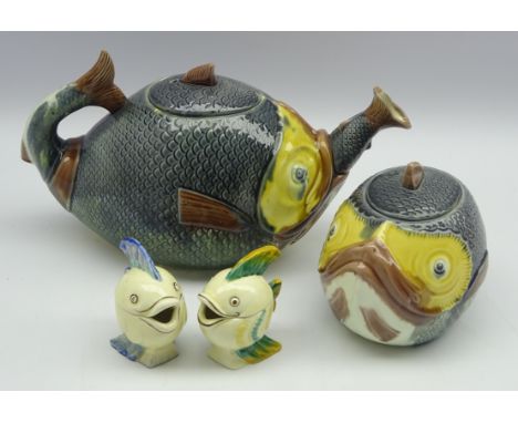 Pair of Wilkinson Clarice Cliff 'Mr Fish' cruets modelled as angel fish, a majolica 'fish' teapot and matching covered jar Co