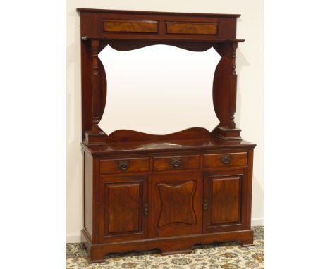Edwardian walnut dresser, raised panelled and bevelled mirror back with turned and fluted supports, three drawers and three c