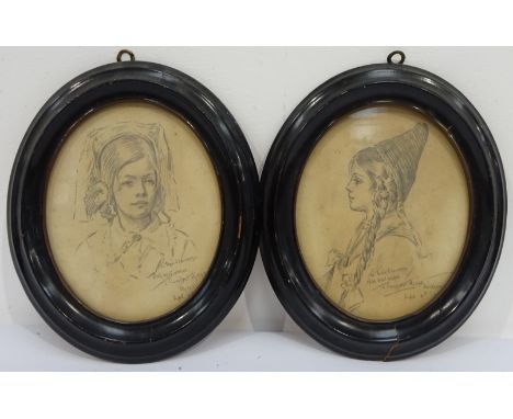 J Campbell Phillips (American 1873-1949): Portrait studies of Sweedish Girls, pair oval pencil sketches signed inscribed and 