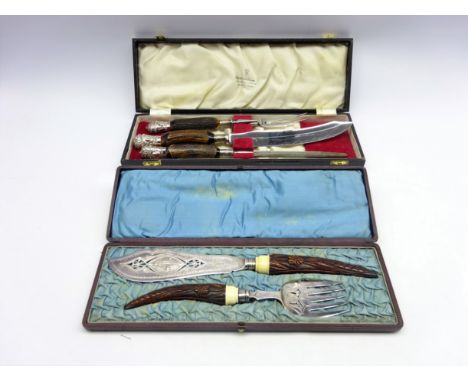 Cased pair of Victorian fish servers with carved softwood handle and a three piece carving set with horn handles silver-plate