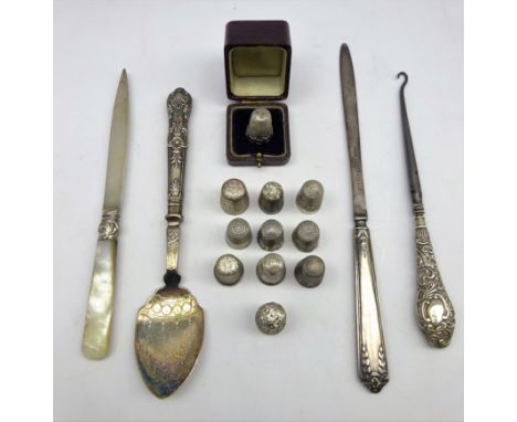 Six various silver thimbles, 5 plated thimbles, silver handled button hook, Elkington plated paper knife and other items Cond