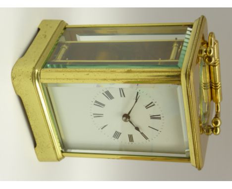 Late 20th century brass carriage clock, white enamel Roman dial, eight day movement, back plate 'Paris, E.G.L'. H14cm Conditi