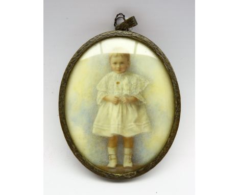 Early 20th century miniature oval portrait on ivory of a child, full length, indistinctly signed, H8.5cm  Condition Report & 