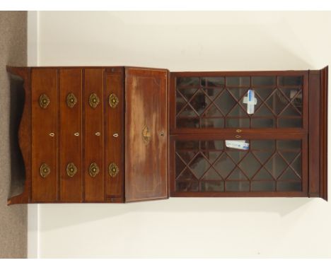 Early 19th century mahogany fall front bureau bookcase with shell inlay, four graduating drawers, inlaid and well fitted inte