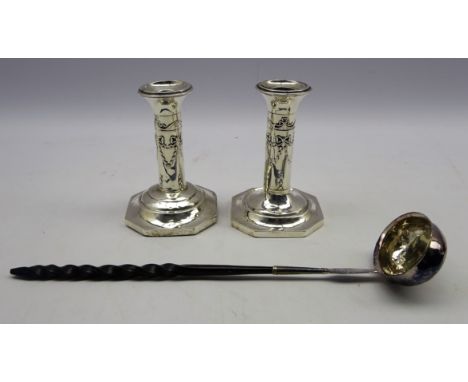 Georgian punch ladle, the oval bowl inset with a George II silver coin and with a twisted whalebone handle and a pair of silv