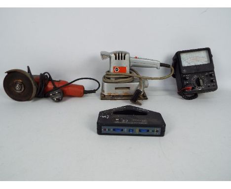 A mixed lot of tools to include an orbital sander, angle grinder, multi-meter and cable finder. Sold as seen and untested.