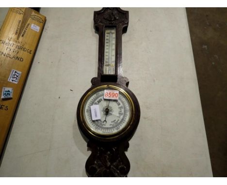 Oak cased mercury barometer, no visible damage to case / thermometer the glass has cracked on the barometer face. Not availab