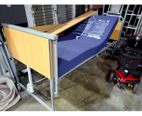 Invacare electric hospital style bed, working at lotting, vendor advises this has never been used. All electrical items in th
