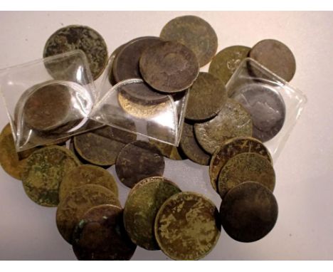 A collection of UK and colonial copper denominations, George II and later, including a 1734 halfpenny, four farthings etc. UK