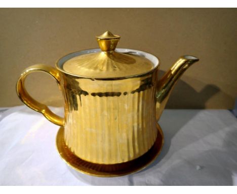 Royal Worcester Gilded teapot on stand. Not available for in-house P&amp;P 