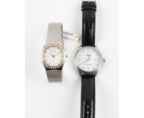A TIMEX wrist watch and a BERING wrist watch. BOOK A VIEWING TIME SLOT ON OUR WEBSITE FOR THIS LOT. IMPORTANT: Online bidding