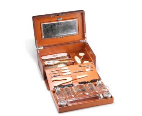 A LATE VICTORIAN LEATHER VANITY CASE, the silver by&nbsp;William Amaziah Ellwick, Birmingham 1895, the hinged cover, with det